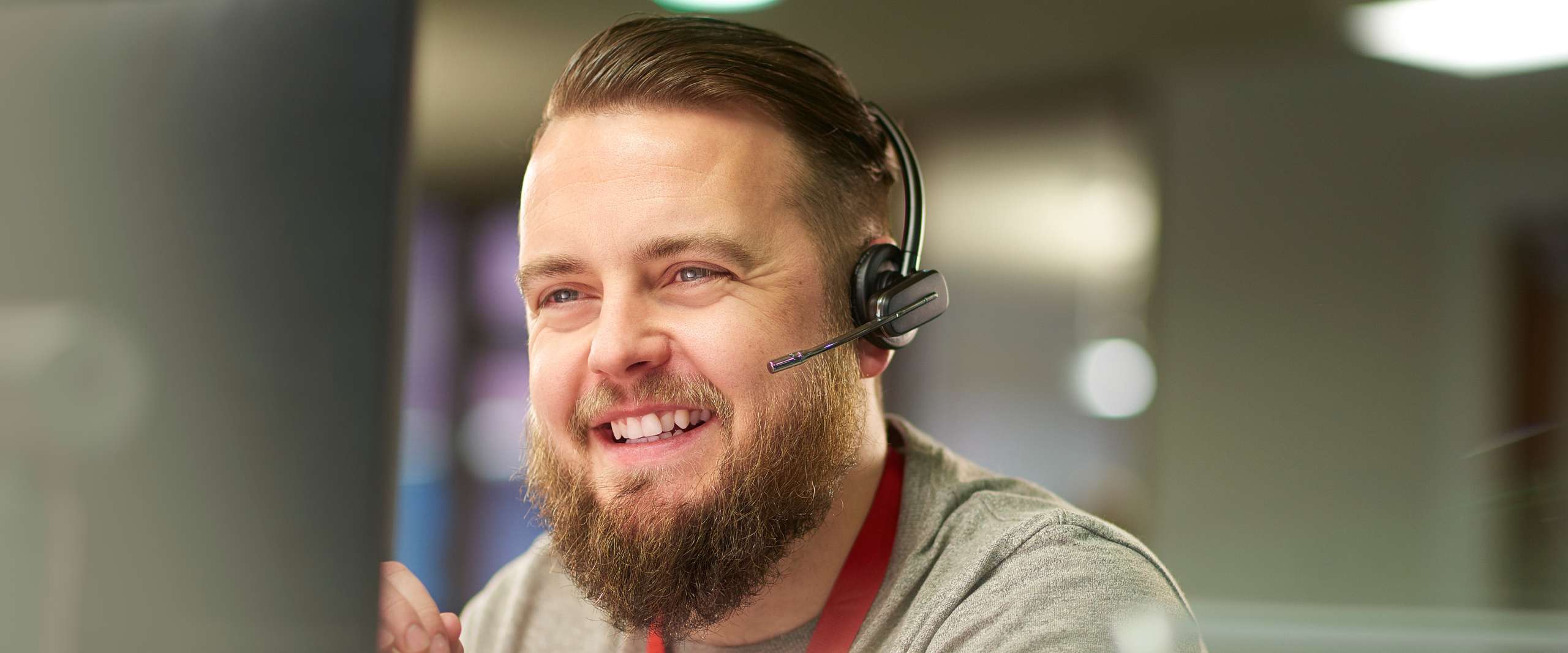 Call centre staff smiling